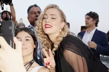 Amber Heard festeggia a Madrid: corsa e gioia familiare dopo il silenzio